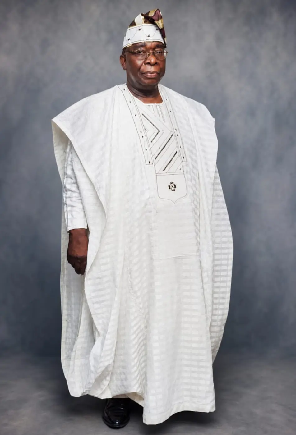 Formal full-length portrait of Chief Abraham Kusemoran Medaiyese